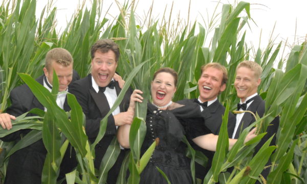 Russell Moss and Brad Zumwalt along with cast member from Boggstown Cabaret in one of the surrounding corn fields.